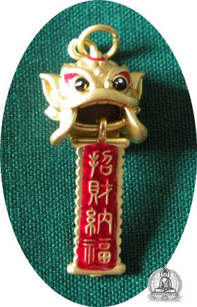 Pendentif chinois masque de dragon.