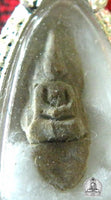 Grains de riz fossile géant sculpté en forme de Bouddha par un moine de forêt Phra Siwali. # 85
