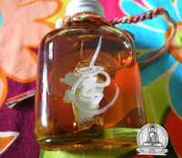Sacred oil of the tiger-faced Lersi - Venerable Acharn Khunpan. #58