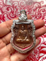 Sacred Medal blessed by the Most Venerable Luang Phor Suang (Wat Tham Phrom Sawat, 2012) # 585