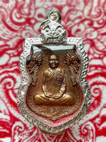 Sacred Medal blessed by the Most Venerable Luang Phor Suang (Wat Tham Phrom Sawat, 2012) # 585